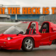A photo of the red Modulo trike with the caption "what the heck is this?"